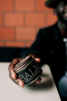 18.21 Man Made product label and ingredient list highlighting premium oils and beeswax