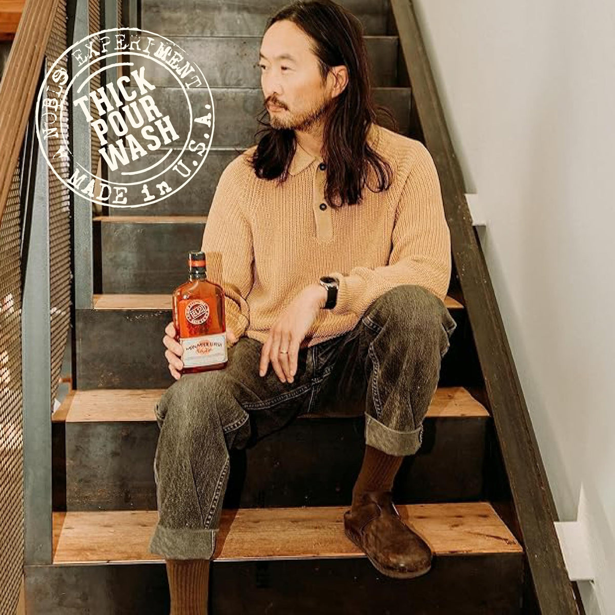 18.21 Man Made bottle staged in speakeasy-style scene conveying premium scent