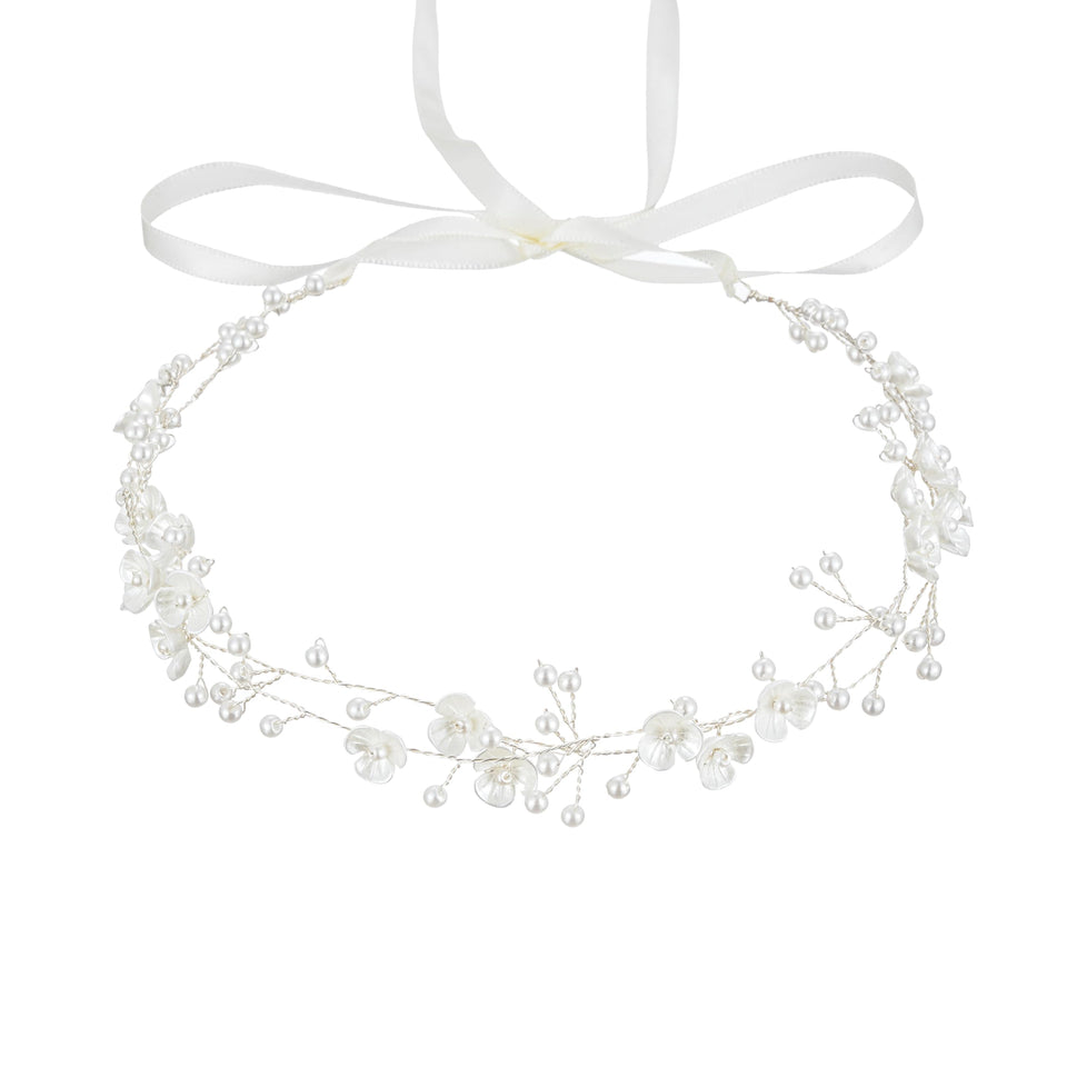 527&huan front view of white flower pearl headband showcasing elegant finish