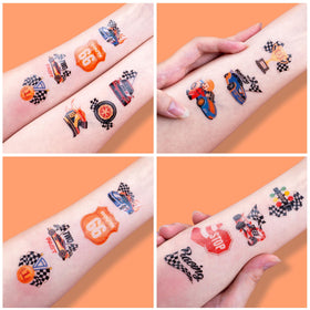 91TATTOOS sheet next to hand for scale, shows child-friendly sticker sizes