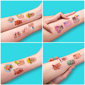 91TATTOOS tattoo sheet next to a hand showing sheet size and quantity