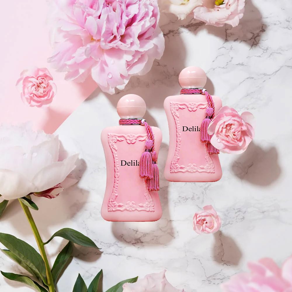 A CENTER Delilah bottle held in hand to show 100ml size and travel readiness