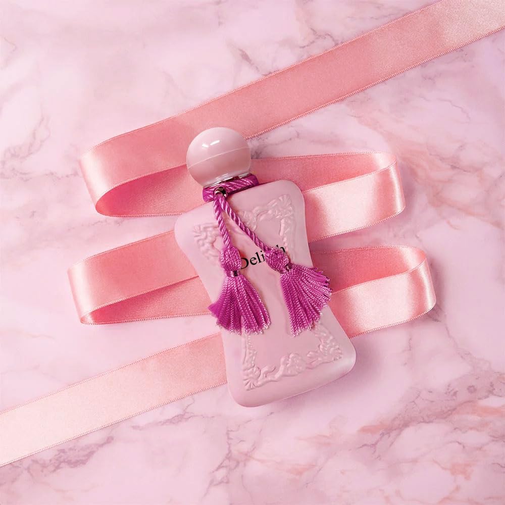 A CENTER Delilah mist over skin illustrating fresh application and lasting aroma