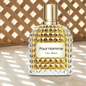 A CENTER Valentine Milano close-up of bottle emphasizing amber floral richness