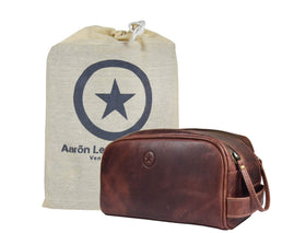 AARON LEATHER GOODS front view of dark brown toiletry pouch showing classic style and capacity