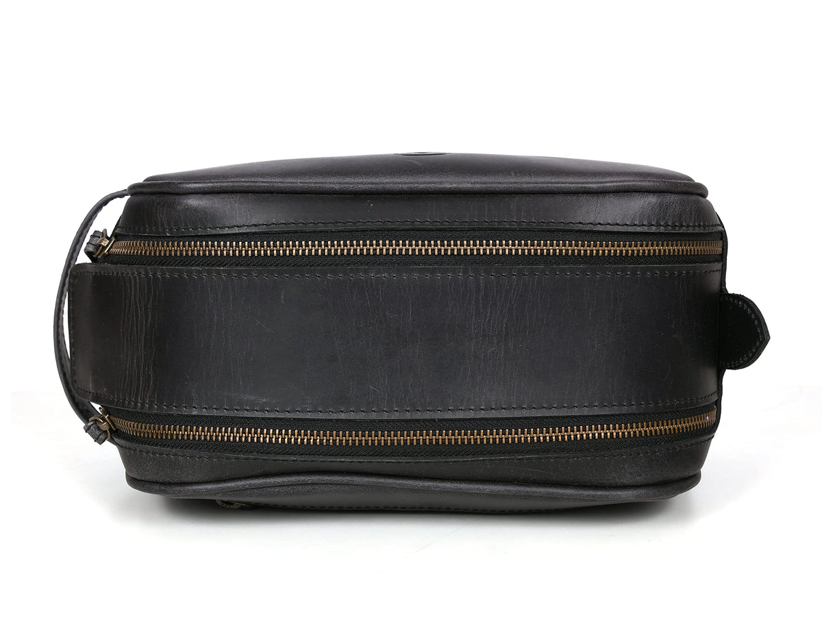 AARON LEATHER GOODS styled on dresser conveying vintage look and daily elegance