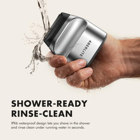 Aberlite Touch 2 next to coin showing compact size and travel-friendly benefit