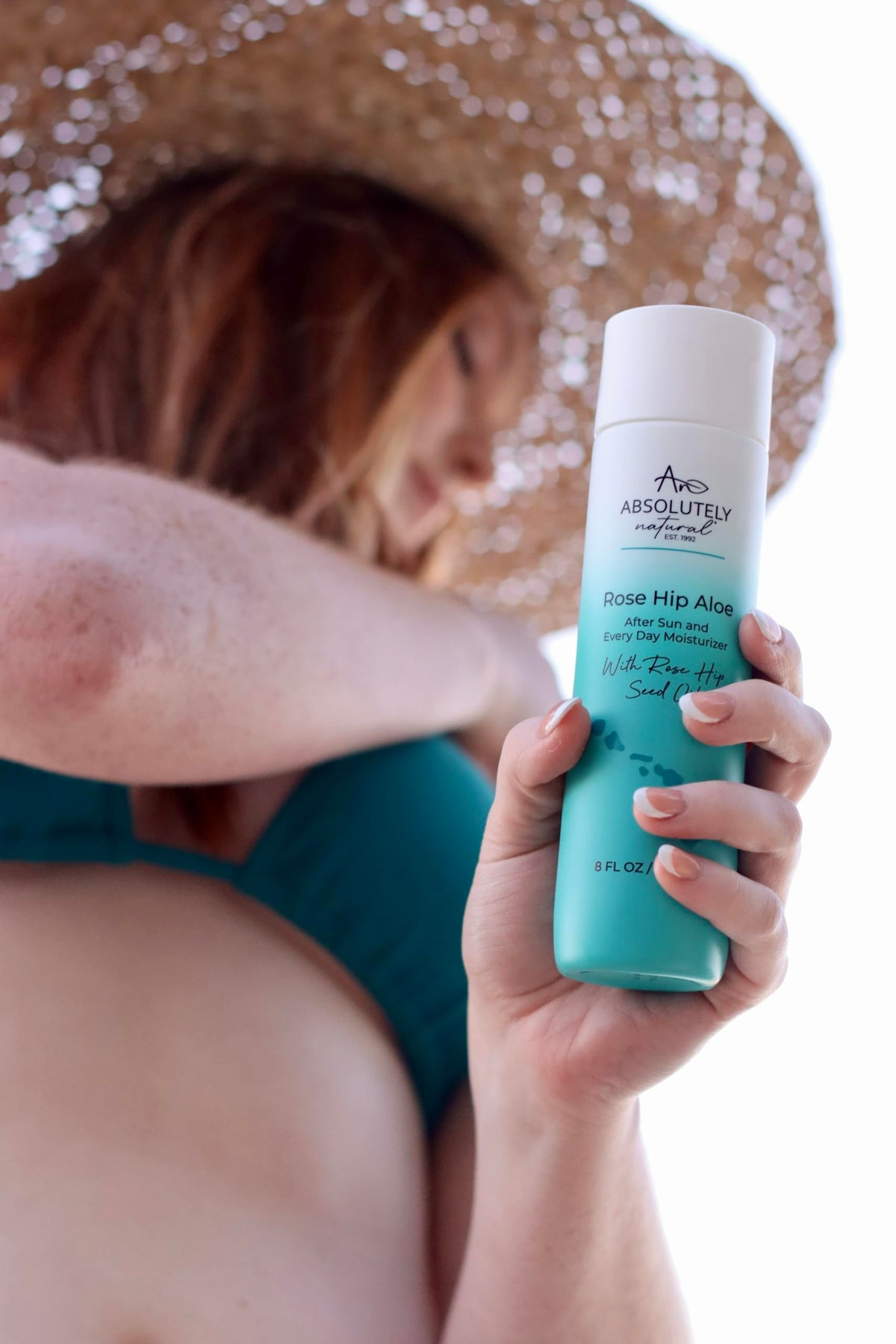 Absolutely Natural rose hip oil dropper highlighting nourishing benefits