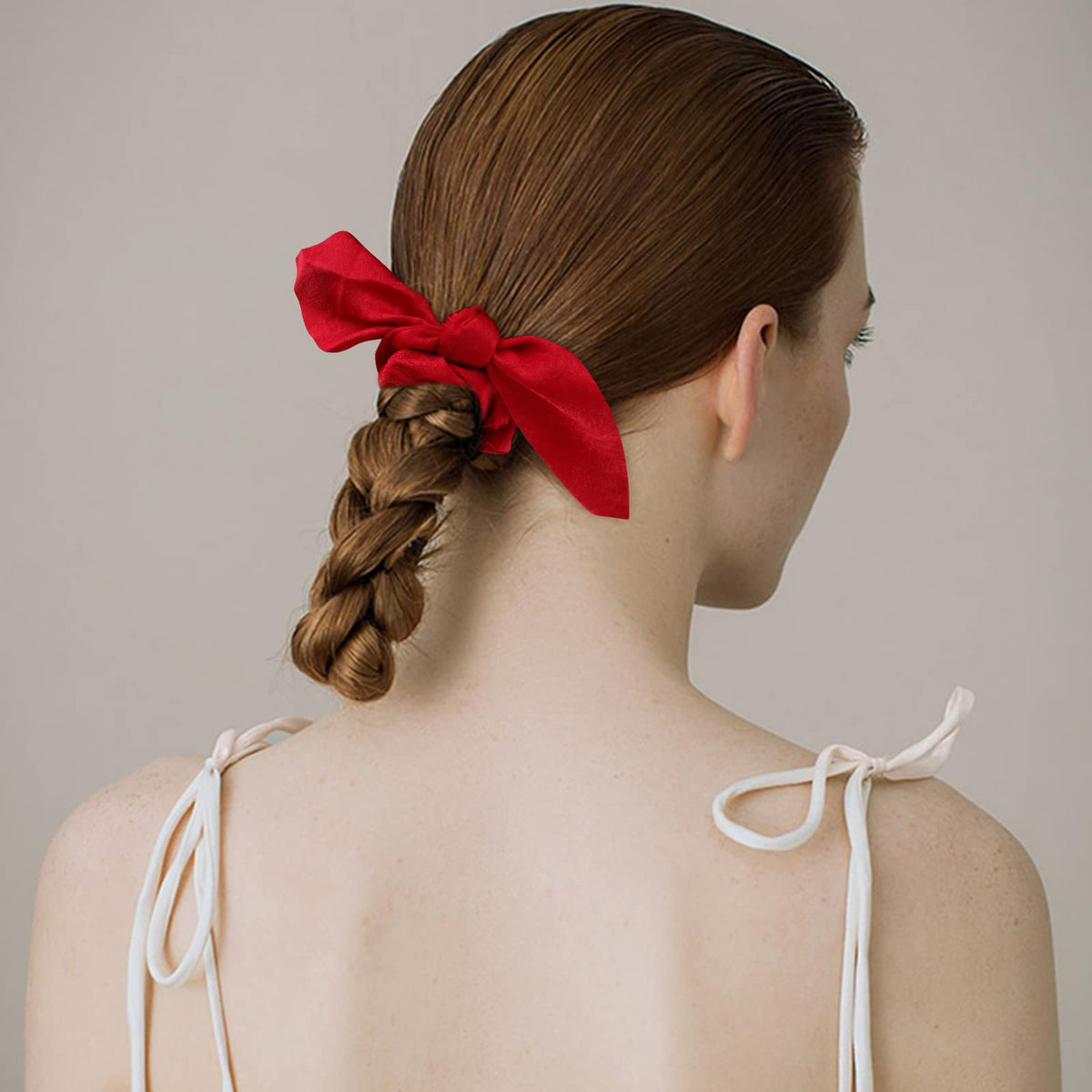 ACO-UINT scrunchie securing a thick ponytail for strong hold benefit