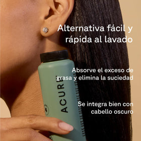 Acure applying powder to roots, quickly reduces oil and adds volume