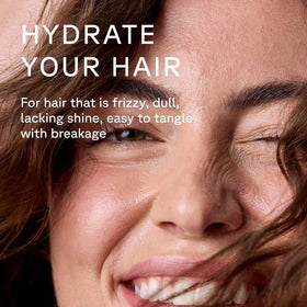 Acure creamy conditioner texture close-up showing rich hydration