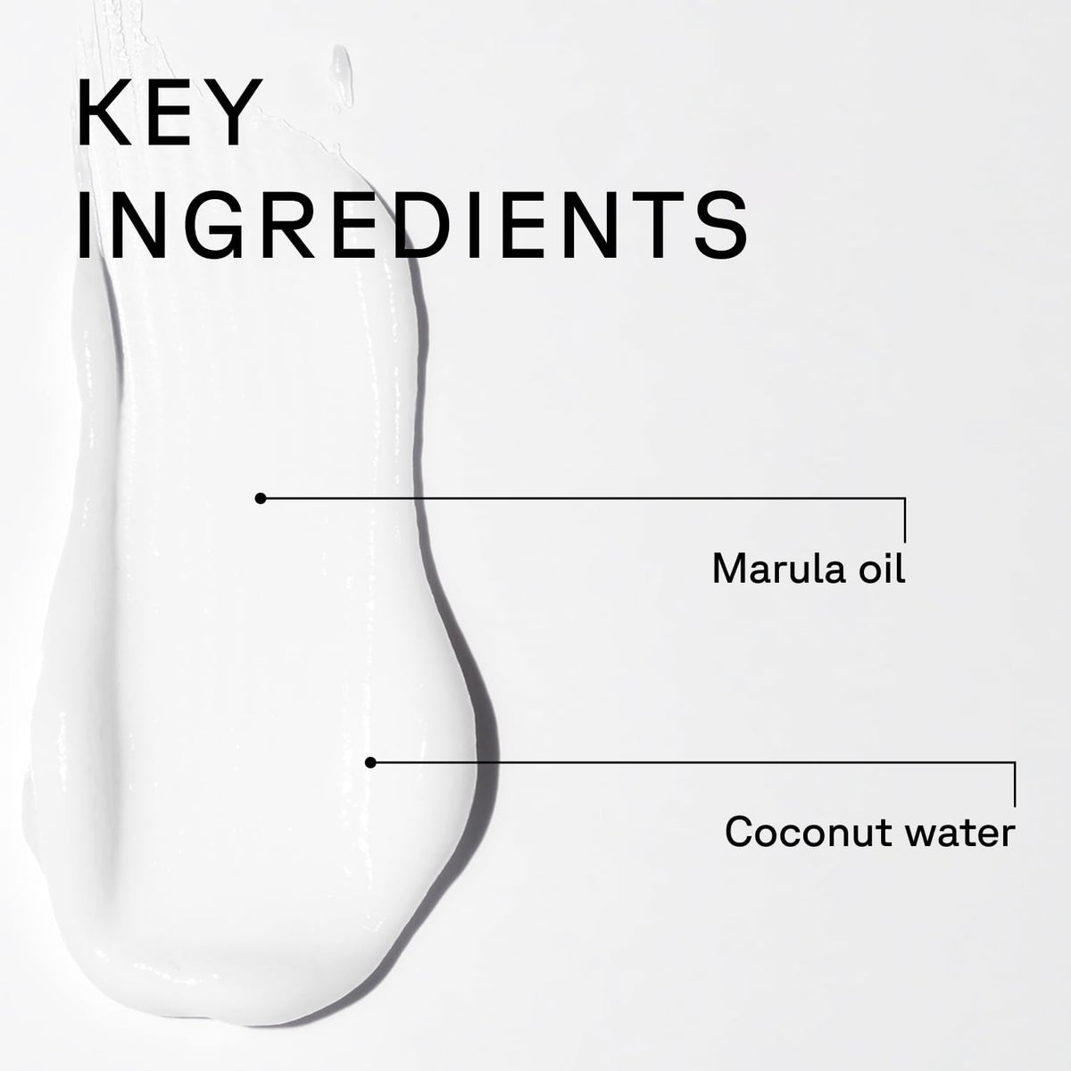 Acure conditioner being applied to hair in hand for easier detangling