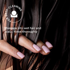 Acure shampoo bottle in a shower setting conveying post-workout refresh routine