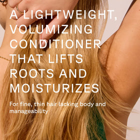 Acure conditioner cream texture close-up showing lightweight consistency