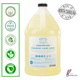 Adams Handmade Soap being poured into a foaming dispenser for easy refills