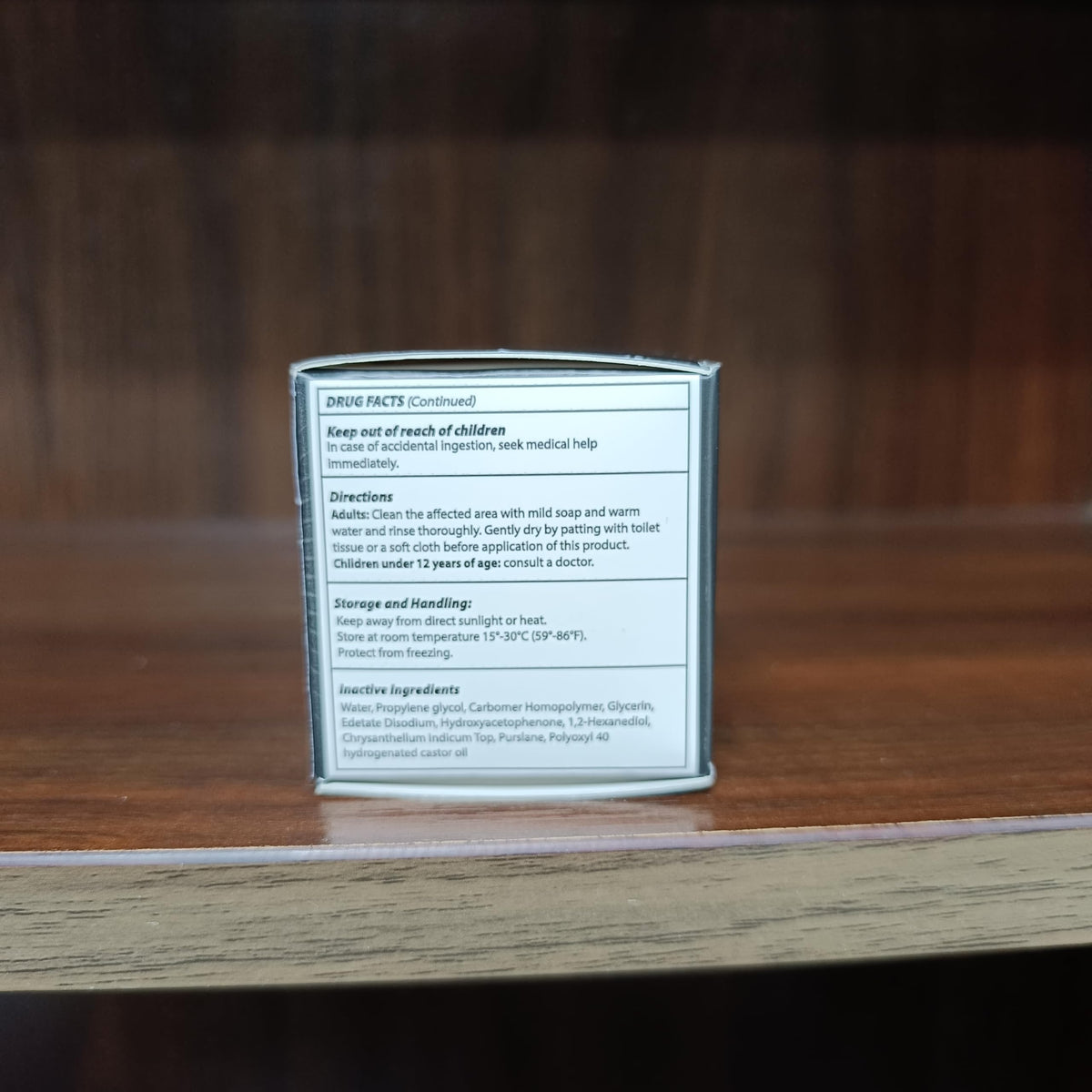 Adellina size comparison next to coin showing compact 1.5 ounce portability