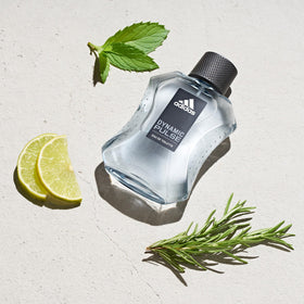 adidas bottle next to travel bag showing compact size for convenience