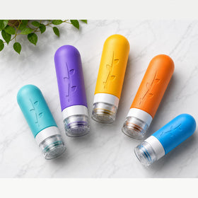 Aeomni toiletry set inside suitcase showing space-saving travel organization