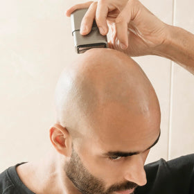 Aesfee detachable head being rinsed for easy cleaning and hygiene