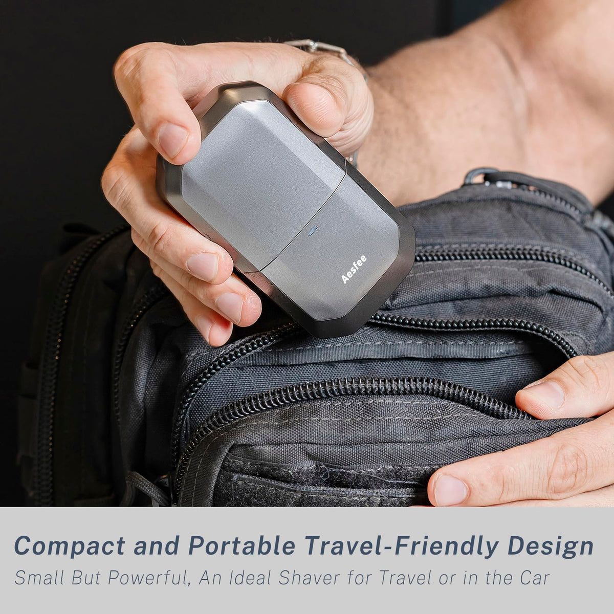Aesfee shaver held in hand to show compact travel-friendly scale