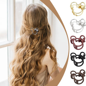 Aesnoun lifestyle shot of woman wearing clip, elegant everyday style benefit