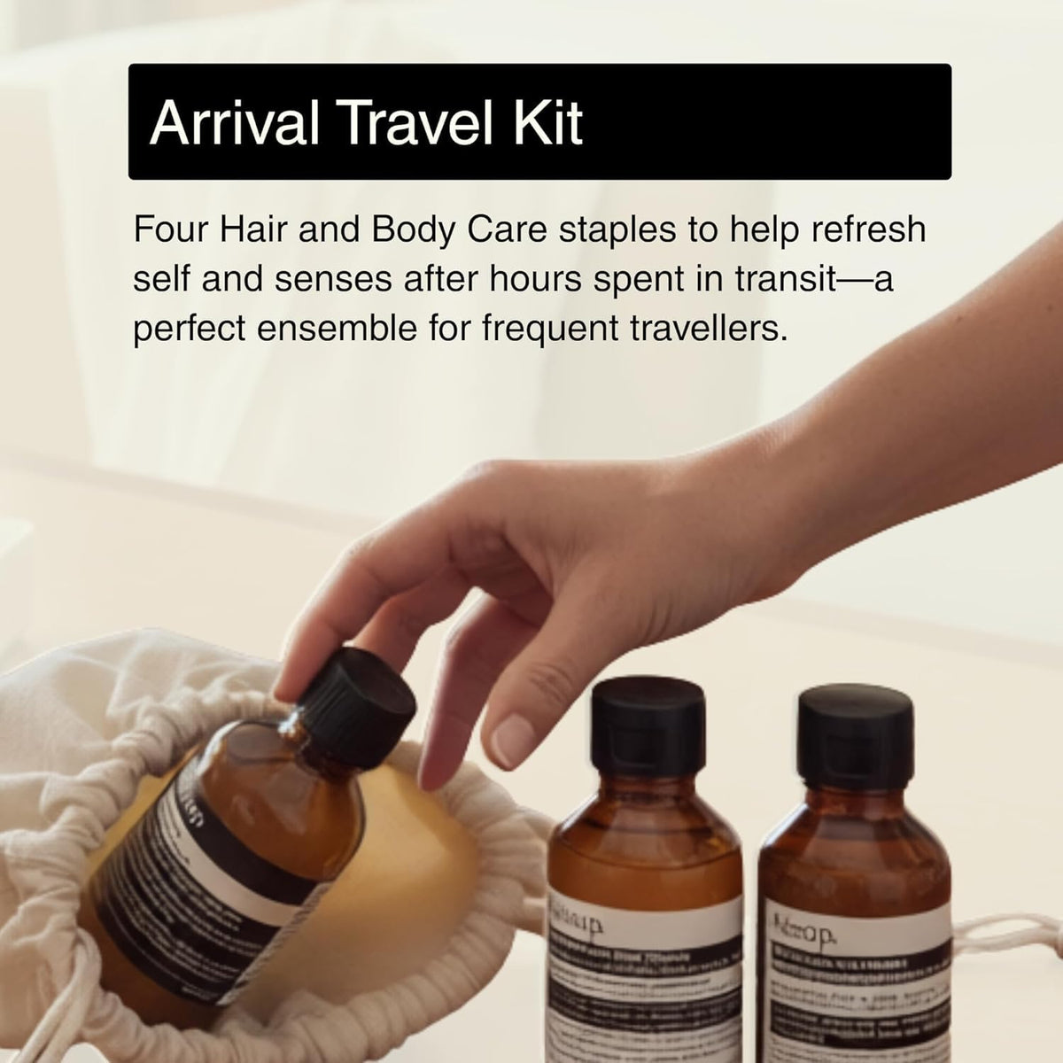 Aesop Arrival canvas bag opened displaying neatly arranged 50 mL tubes for tidy storage