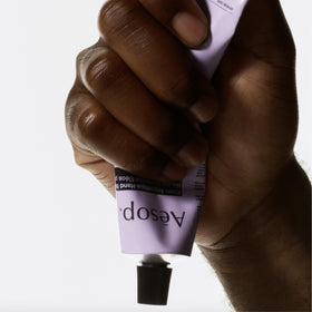 Close-up of Aesop Eleos label showing key ingredients and vegan, paraben-free benefit