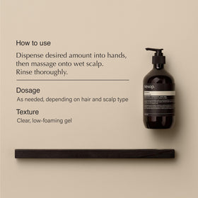 Aesop shampoo pump dispensing clear lather to show gentle cleansing action
