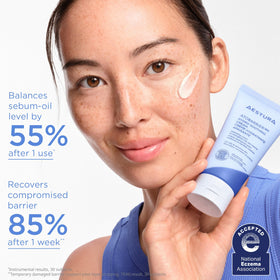 AESTURA cream in hand demonstrating 80ml size and easy-spread lightweight feel