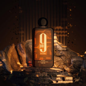 Nighttime lifestyle scene with Afnan 9 PM Elixir suggesting elegant evening wear