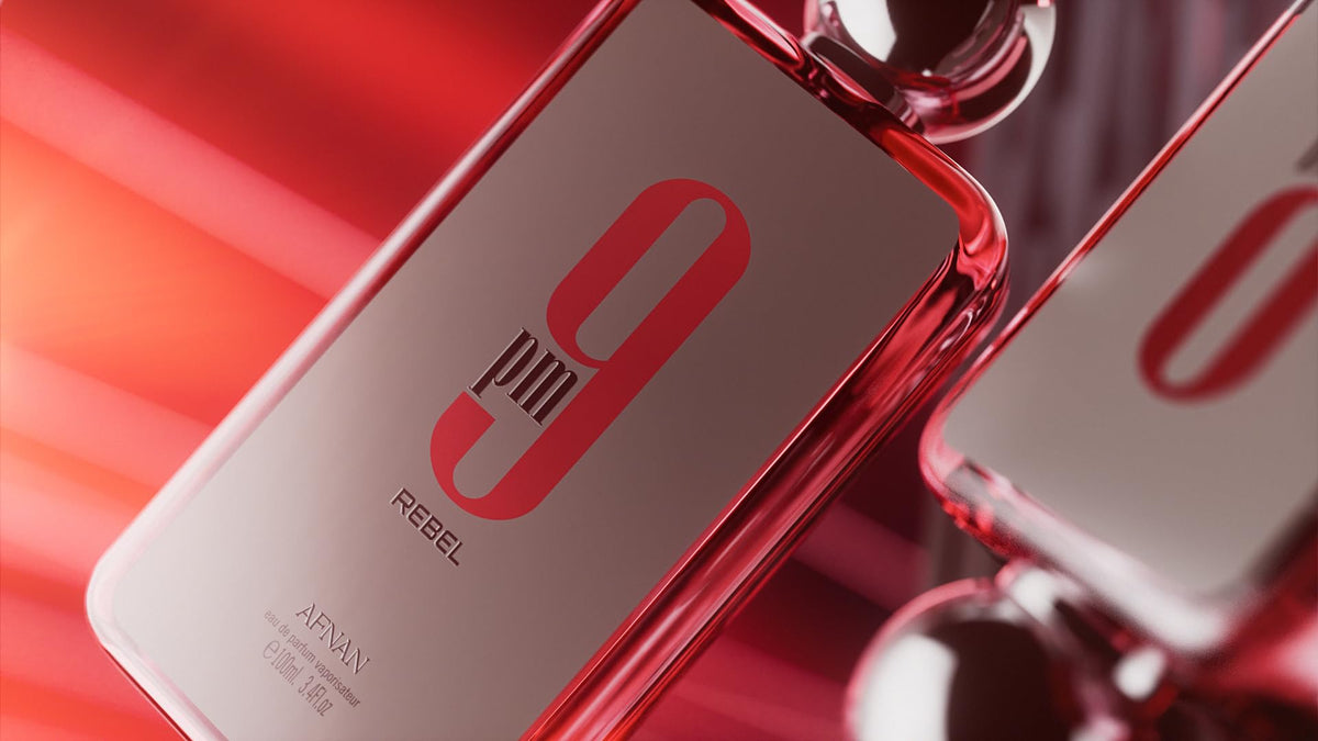 Afnan 9 PM Rebel packaging box label closeup showing collection branding and quality