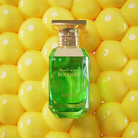 Afnan Mystique Bouquet poured next to fruit showing size and fragrance intensity