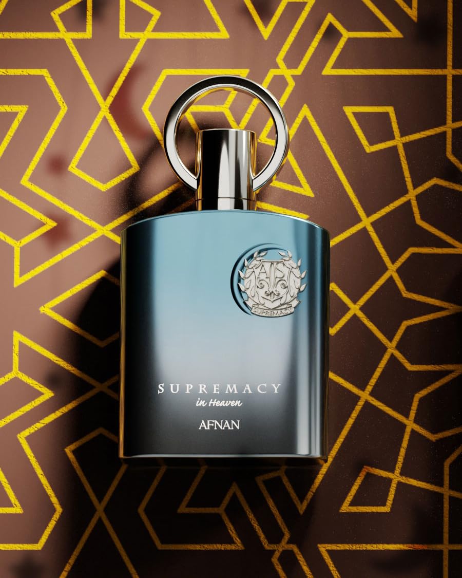 Afnan bottle in hand for scale, illustrating 3.4 fl. oz practical size