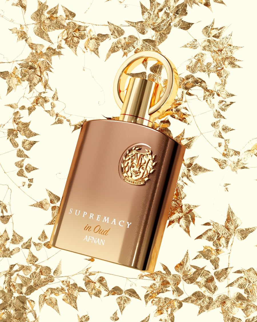 Afnan flatlay of oud wood and spices evoking fragrance notes and richness