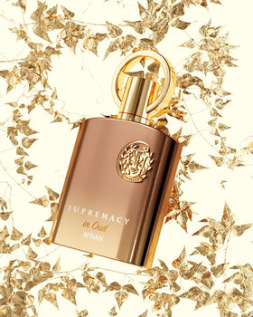 Afnan flatlay of oud wood and spices evoking fragrance notes and richness