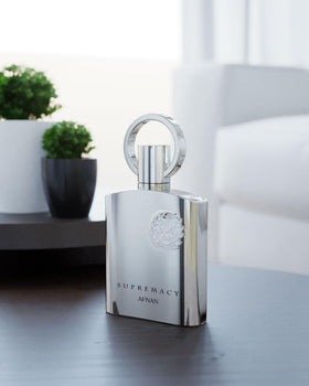 Afnan bottle side label visible for product identification and notes