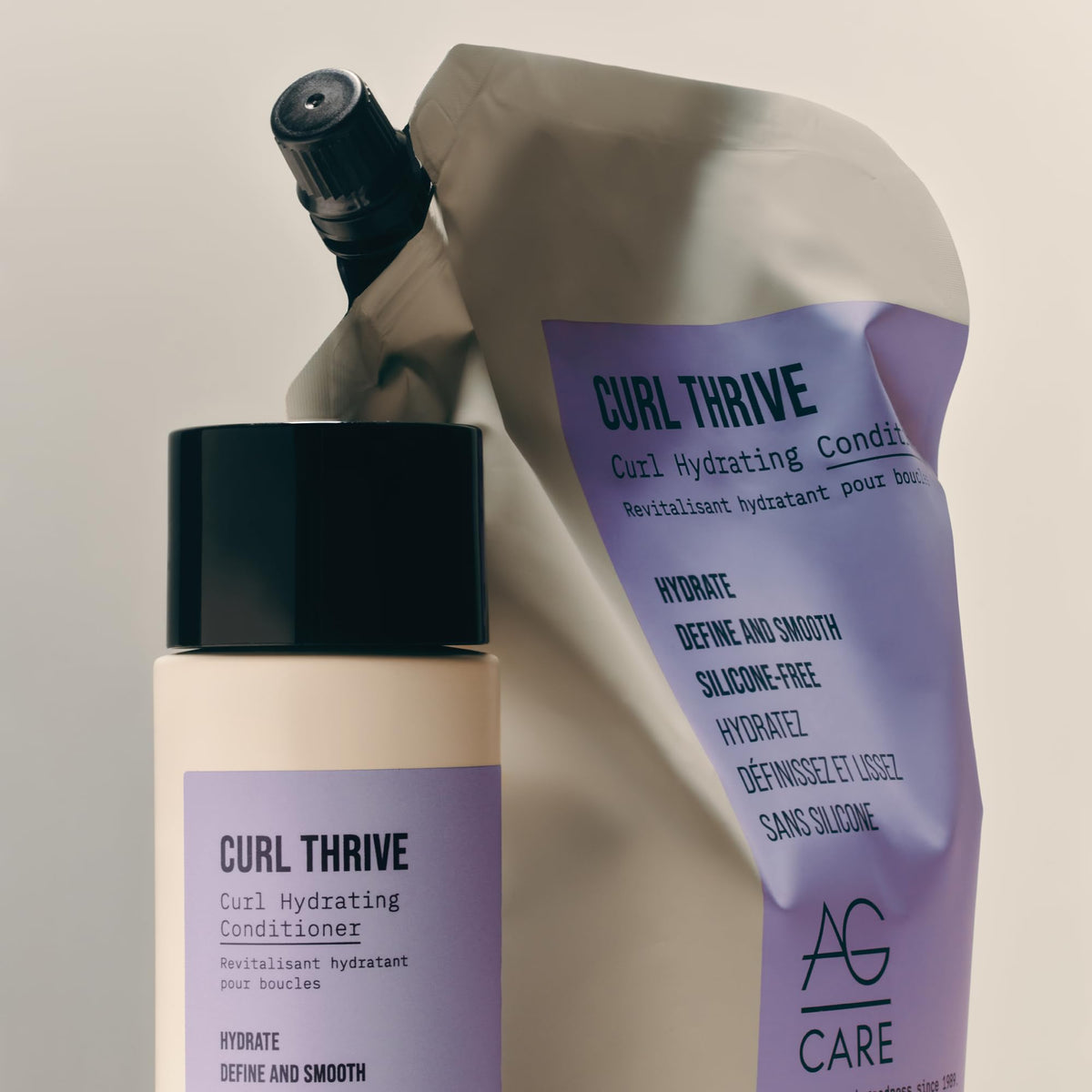 AG Care lifestyle shot of defined curly hair showcasing softened, frizz-reduced curls
