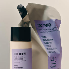 AG Care lifestyle shot of defined curly hair showcasing softened, frizz-reduced curls