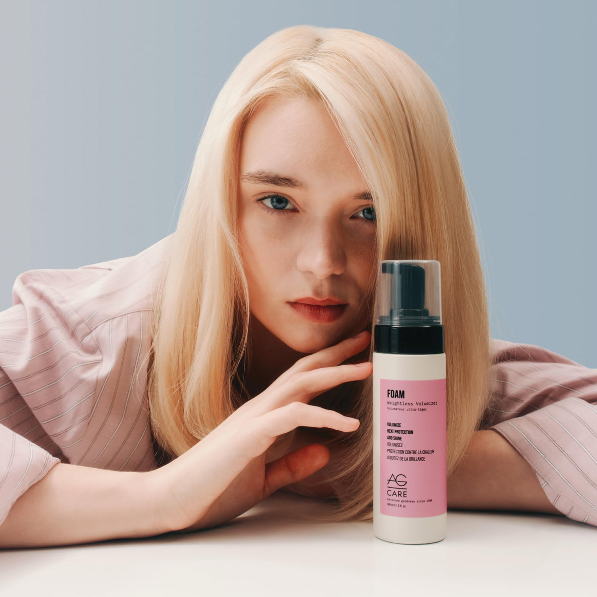 AG Care volumizer on bathroom shelf in lifestyle setting suggesting everyday styling convenience