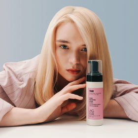 AG Care volumizer on bathroom shelf in lifestyle setting suggesting everyday styling convenience