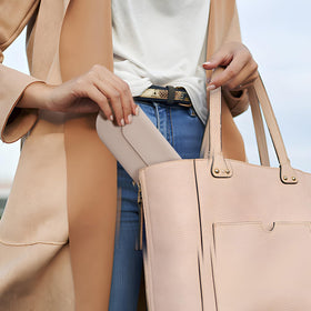 AGIKET lifestyle travel pouch on suitcase conveying travel convenience