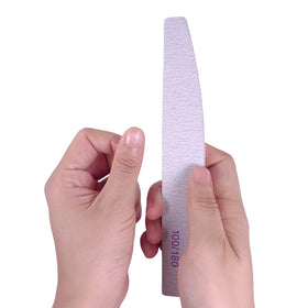 AhaTopia file shaping an acrylic nail for quick reduction