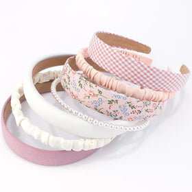 AHONEY close-up of knotted headband detail highlighting comfortable style