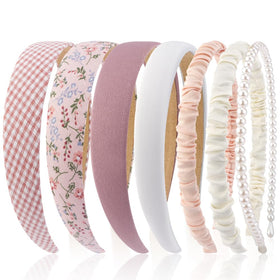 AHONEY front view of seven pink headbands showing variety and matching tones