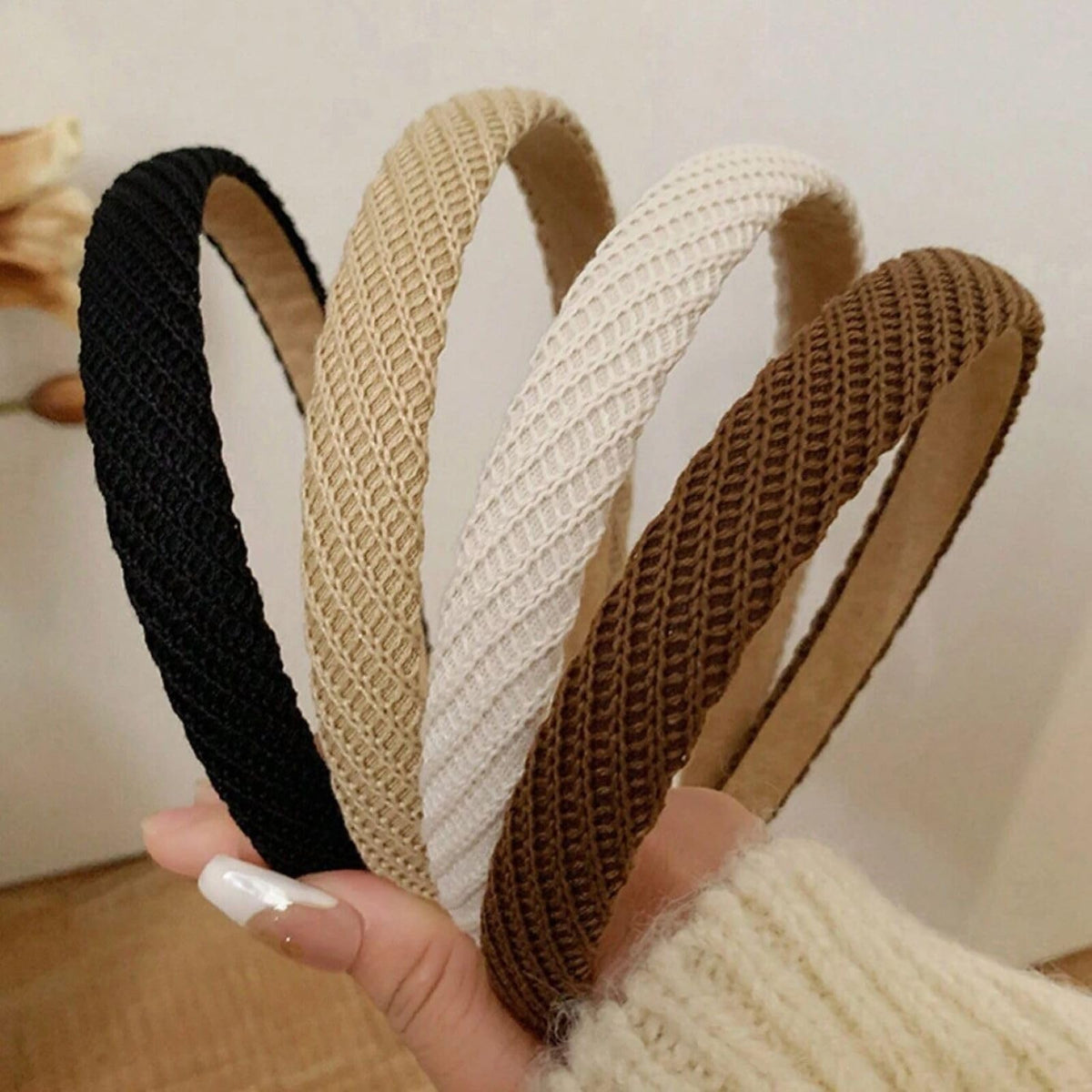AIBFRID front view of four headbands showing colors and neat packaging benefit style
