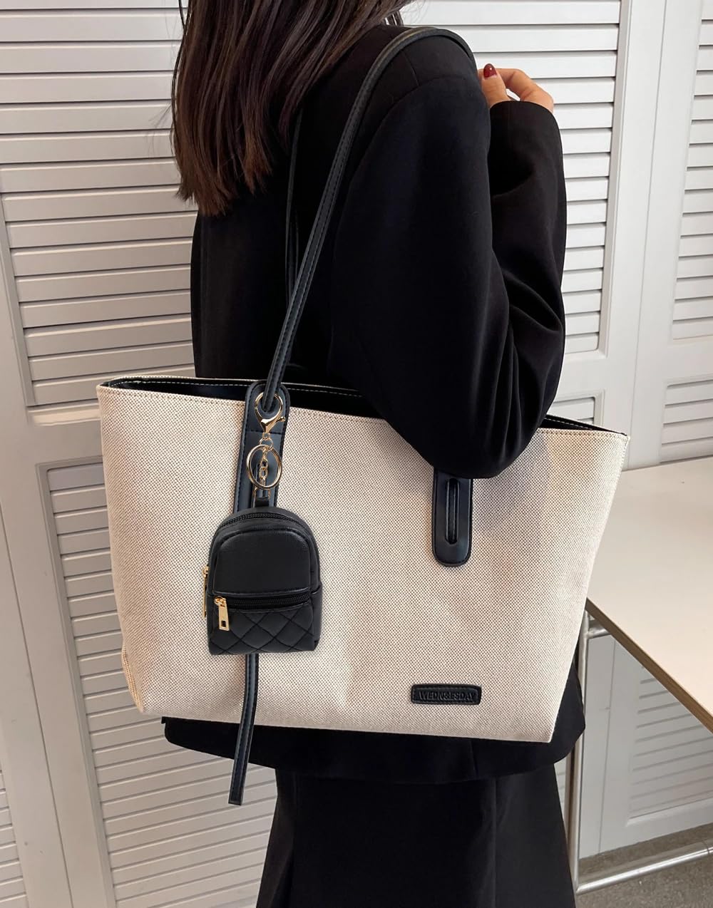 AIBFRID pouch held in hand to illustrate true-to-life size and portability benefit
