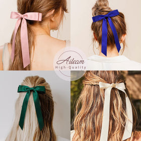 Aileam child wearing bow in ponytail, neat polished hairstyle benefit