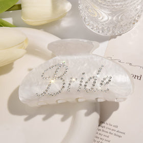 Aileam close-up rhinestone bride logo detail adds sparkle benefit