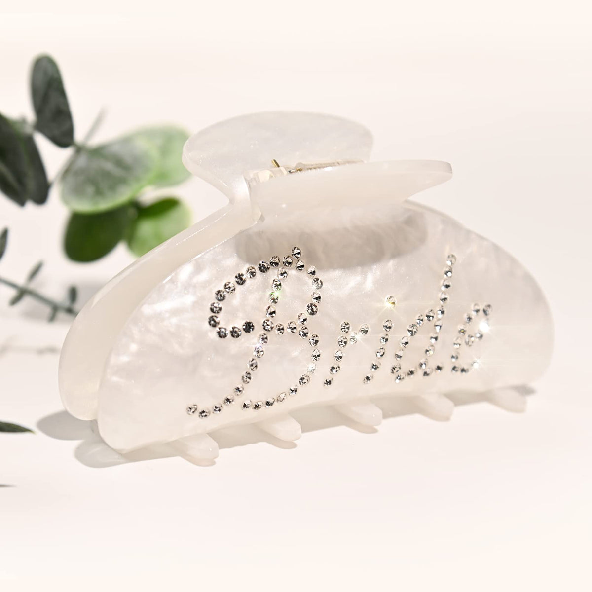Aileam front view white acrylic bride clip shows elegant hold benefit