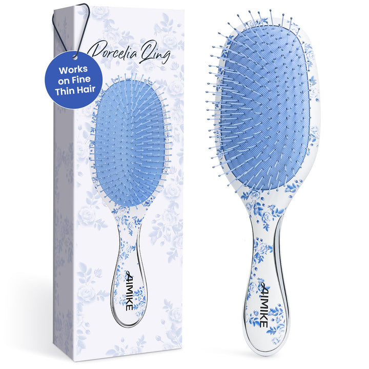AIMIKE front paddle brush showing porcelain floral design and elegant finish for style